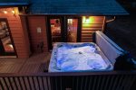 Hot tub on the main floor with beautiful lights for nighttime relaxation